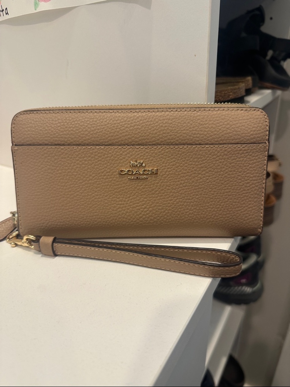 Coach Taupe Pebbled Leather Wristlet with Gold Logo